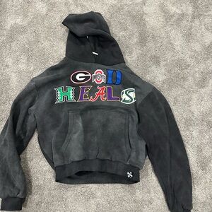 black acid washed God Heals Hoodie